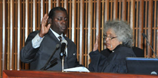 Five months in, HCC leaders won’t put financial cap on Chris Oliver bribery probe HCC Trustee Chris Oliver (left)