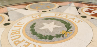 Abbott continues salvos against Sarah Davis